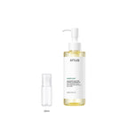 20ml sample bottle next to the full-size Anua Heartleaf Pore Control Cleansing Oil 200ml bottle