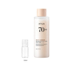 10ml sample bottle next to the full-size Anua Rice 70 Glow Milky Toner 250ml bottle