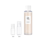 10ml and 20ml sample bottles next to the full-size Beauty of Joseon Glow Replenishing Rice Milk 150ml bottle