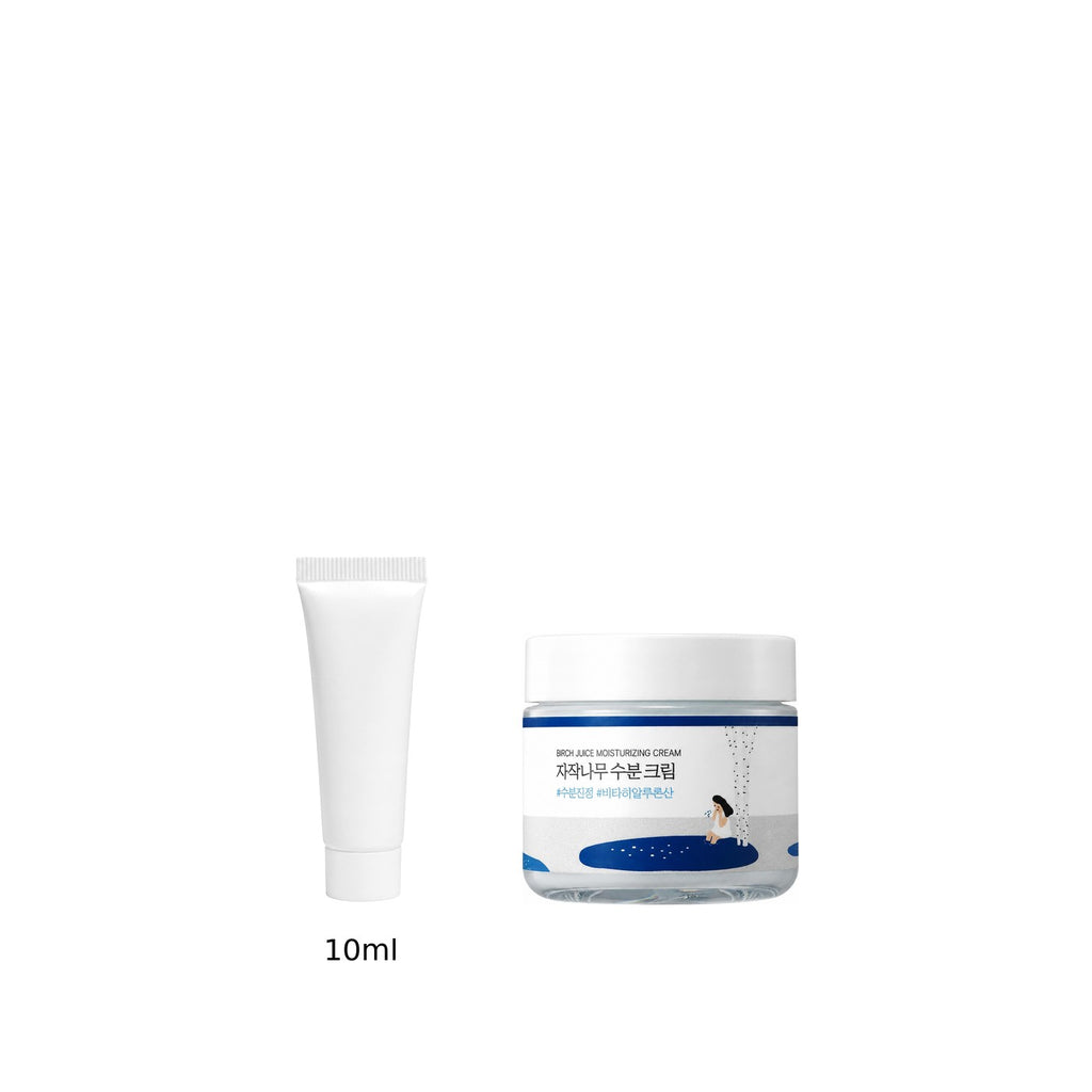 10ml sample tube next to the full-size Round Lab Birch Juice Moisturizing Cream 80ml jar