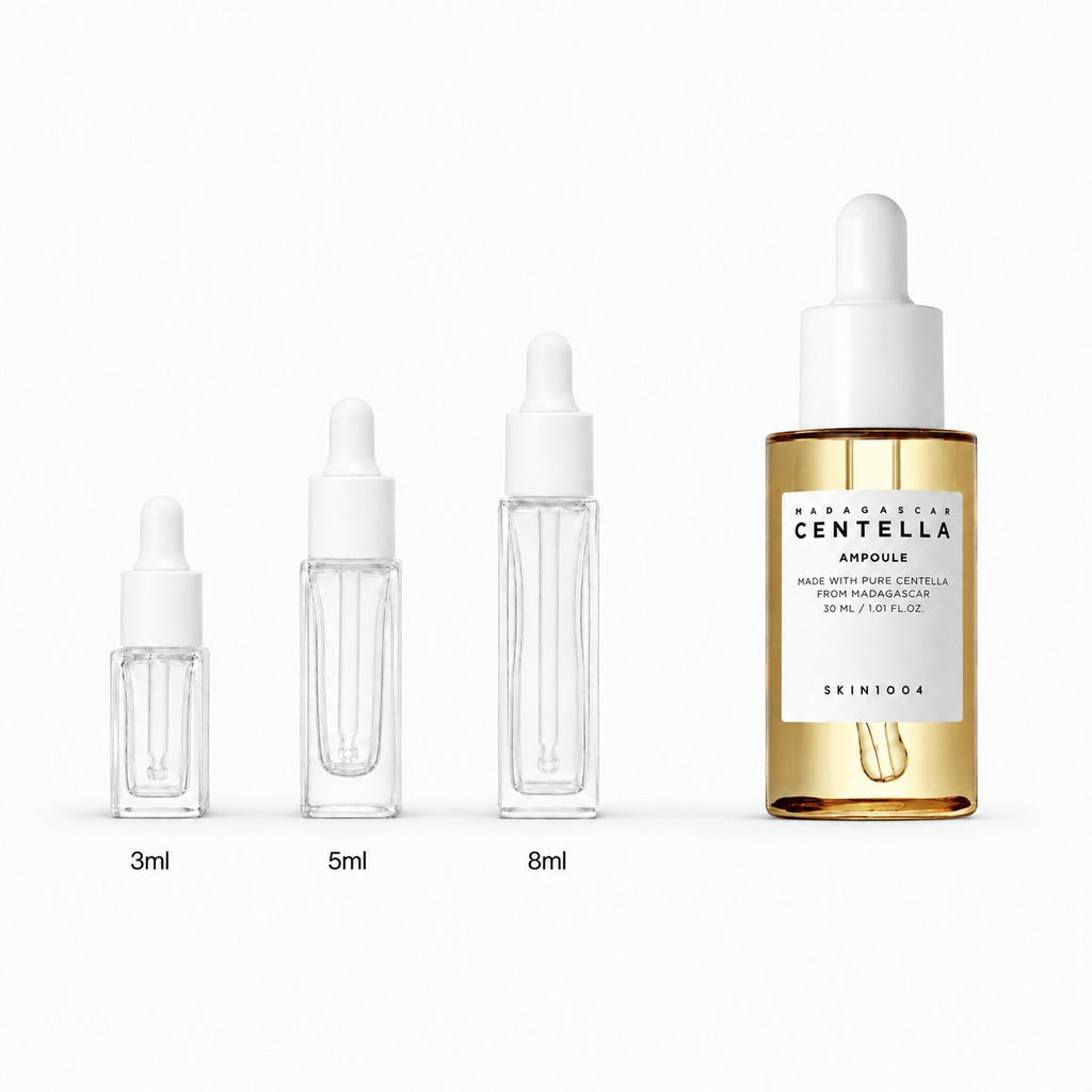 3ml, 5ml and 8ml sample droppers next to the full-size SKIN1004 Madagascar Centella Asiatica 100 Ampoule 100ml bottle