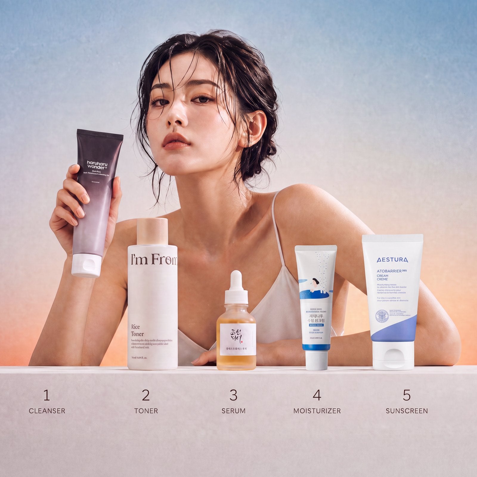 A 5-step Korean skincare routine: cleanser, toner, serum, moisturizer and sunscreen samples